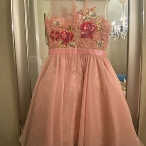 Pink Sherri Hill- $75; Gold Terani Couture- $75